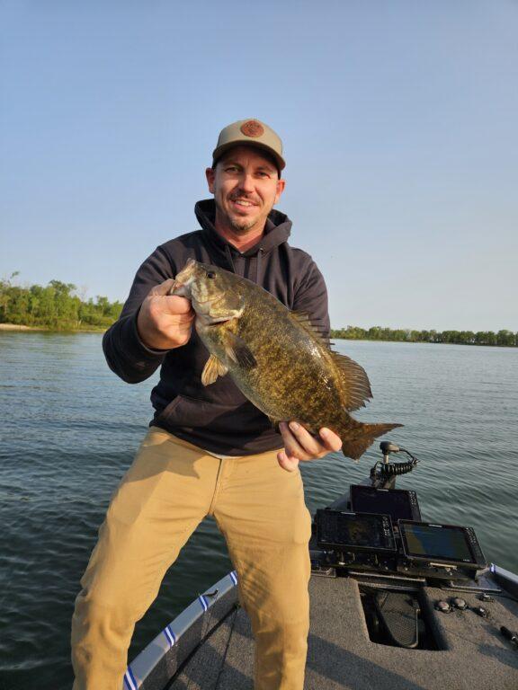 Mike from Georgia with a big Lake Erie bass in June