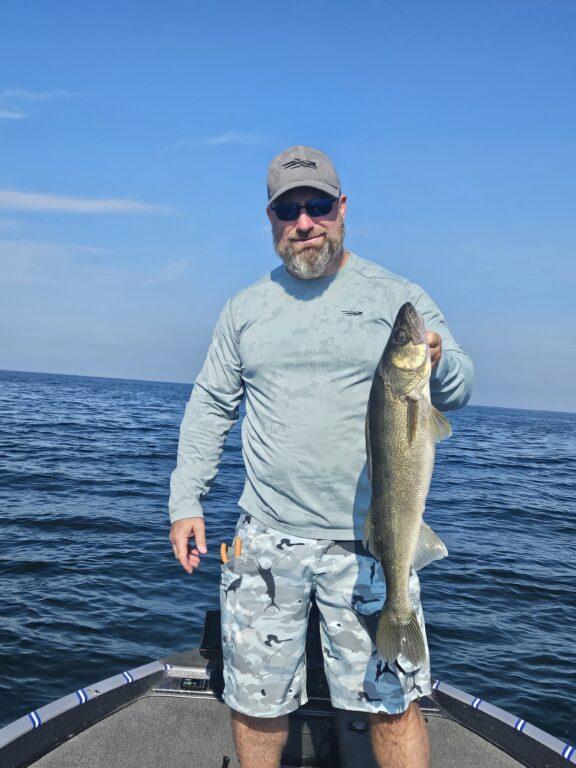 Client Joe with a Big Lake Erie walleye with Big Fat Bass Guide Service