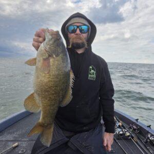 Big Fat Bass Guide Service client Jeff with a 6 lb plus smallmouth bass on Erie