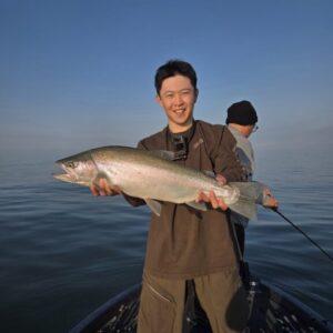 Neil with a giant Lake Erie steelhead trout with Big Fat Bass Guide Service