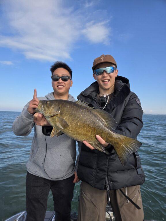Neil and Junlin with a fat Lake Erie fall smallmouth