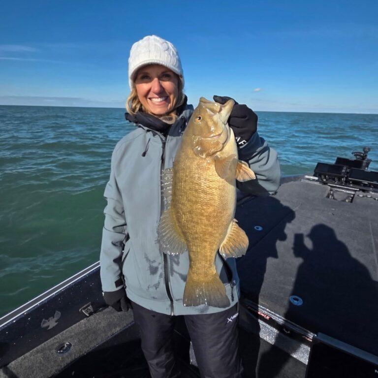 Big Fat Bass Guide Service client Diane with a big fall Lake Erie smallmouth bass