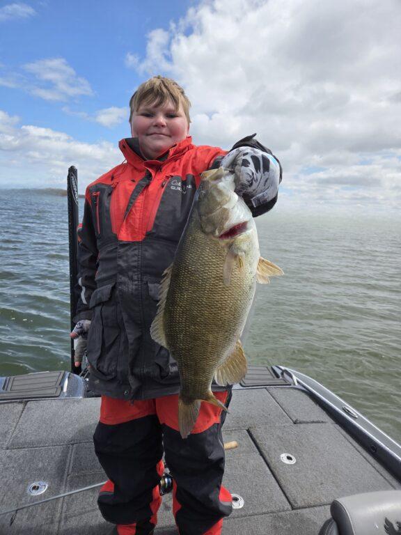 Big Fat Bass client Hank with a spring prespawn Erie smallmouth