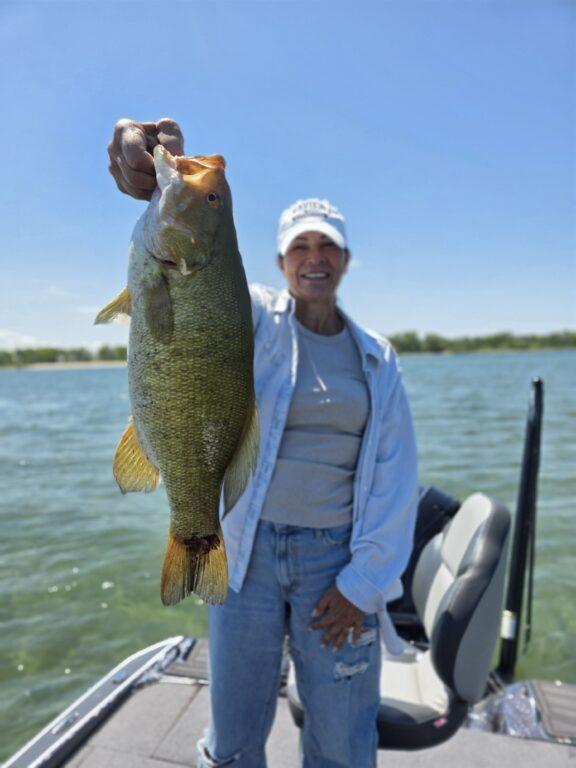 Women catch big smallmouth bass on Erie - Big Fat Bass Guide Service