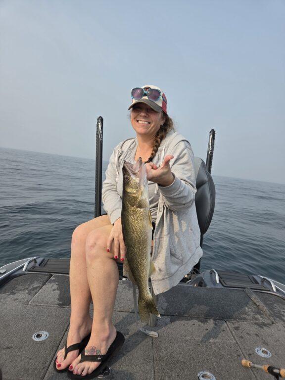 Casting for Lake Erie walleye during a summer guided fishing trip
