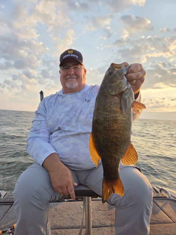 Lake Erie smallmouth bass caught on offshore structure during a mid-August guide trip